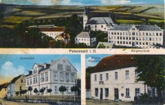 dobová pohlednice vsi s kostelem
