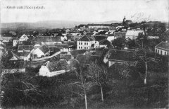 dobová pohlednice vsi s kostelem