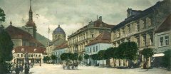 dobová pohlednice starého Mostu s kostelem