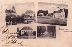 dobová pohlednice vsi s kostelem