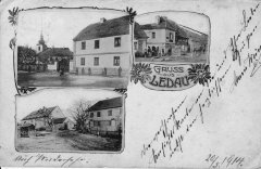 dobová pohlednice vsi s kostelem