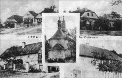 dobová pohlednice vsi s kostelem