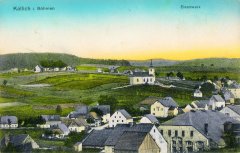 dobová pohlednice vsi s kostelem