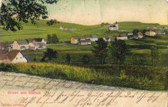 dobová pohlednice vsi s kostelem