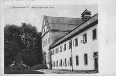 kostel s klášterem na dobové pohlednici
