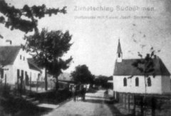 dobová pohlednice vsi s kaplí