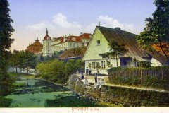 dobová pohlednice města s kostelem na kopci