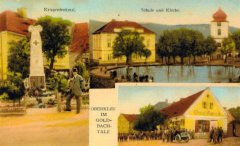dobová pohlednice vsi s kostelem