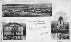 dobová pohlednice vsi s kostelem