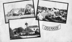 dobová pohlednice vsi s kostelem