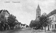 dobová pohlednice vsi s kostelem