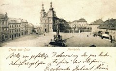 dobová pohlednice města s kostelem