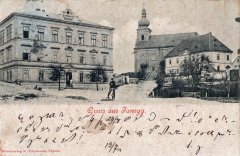 dobová pohlednice vsi s kostelem