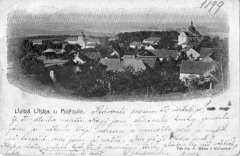 dobová pohlednice vsi s kostelem
