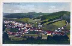 dobová pohlednice vsi s kostelem